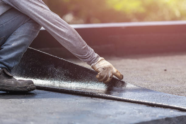 Professional Basement Waterproofing technician working in Chillicothe, IL